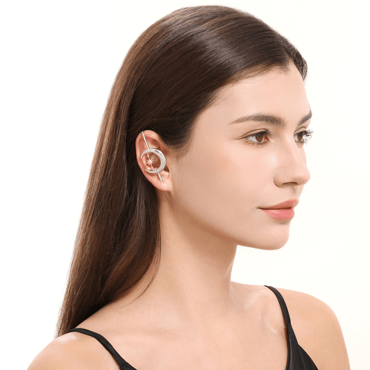 Cosmic Connection ear cuff in silver worn on the ear, profile view
