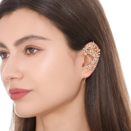 Flourishing ear cuff worn on the ear, profile view