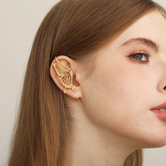 Gentle Butterfly ear cuff worn on the ear, profile view