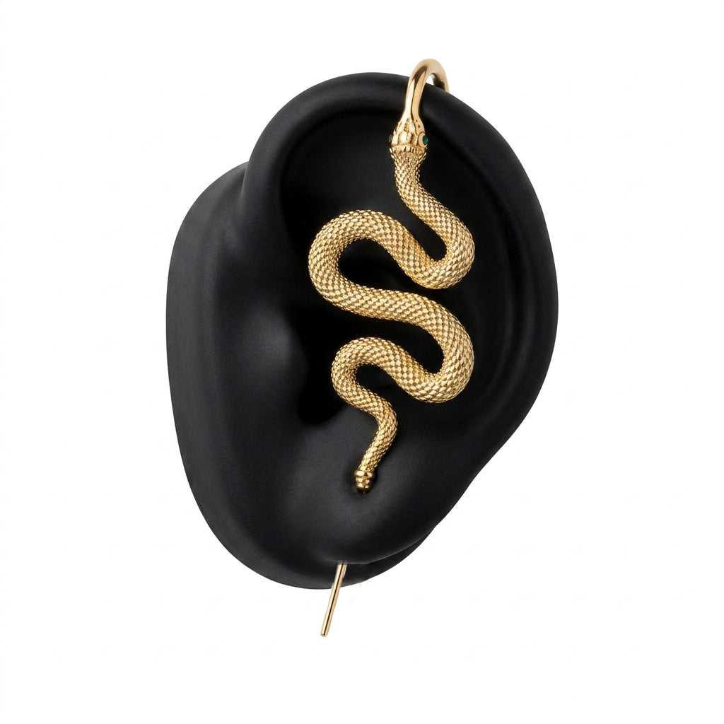 Serpent ear cuff in gold on a black ear form