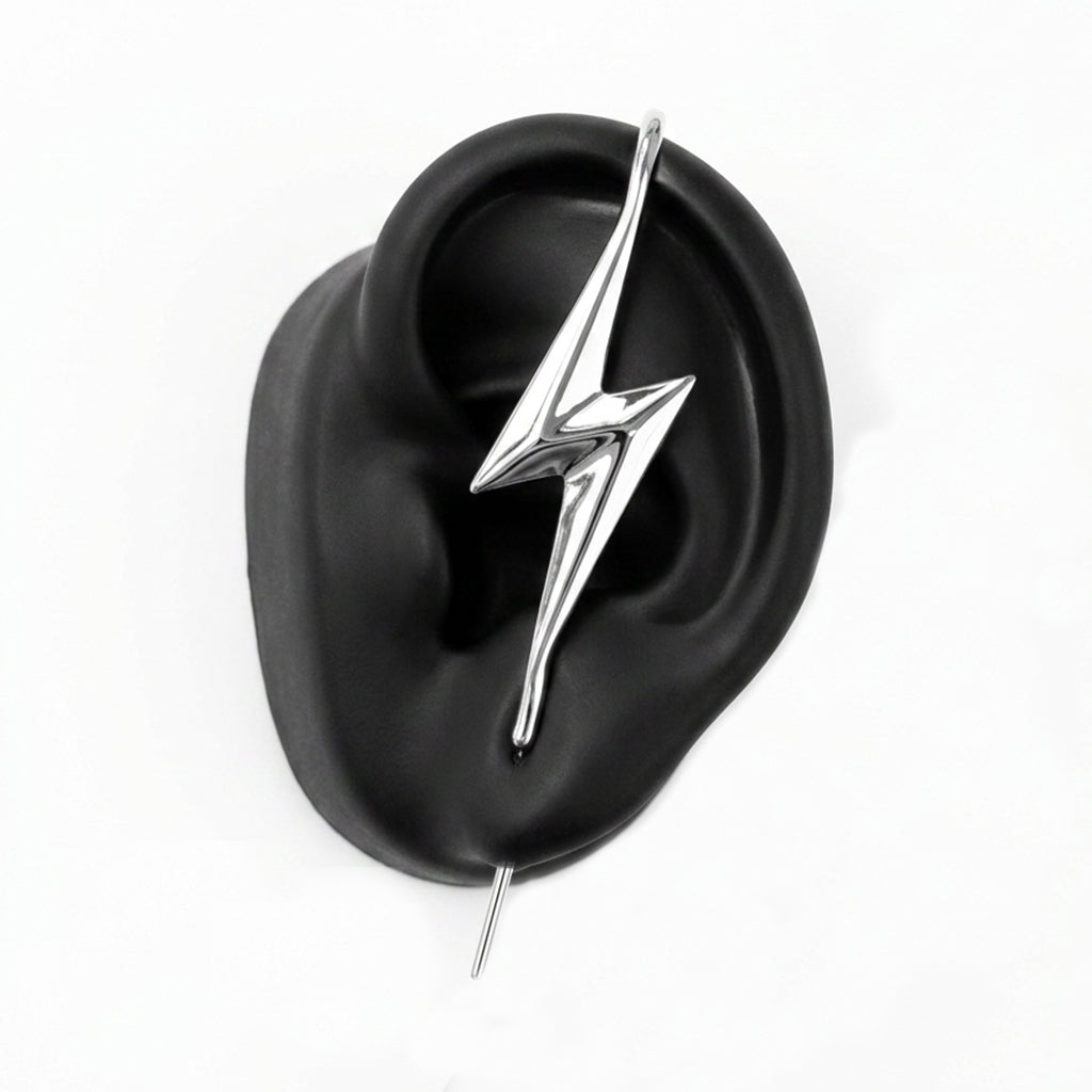 Lightning Bolt ear cuff in silver on a black ear form