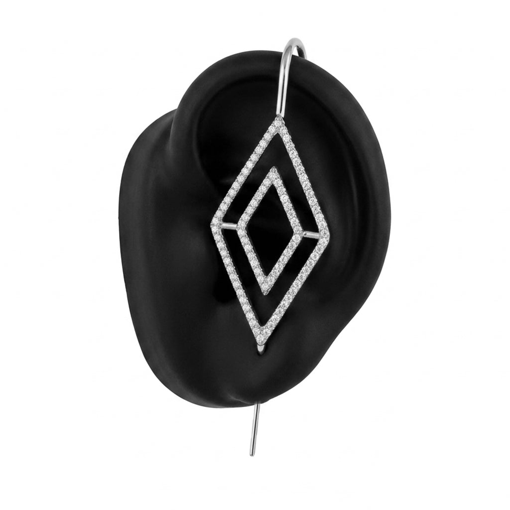 Diamond ear cuff in silver on a black ear form