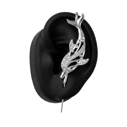 Graceful Dolphin ear cuff in silver on a black ear form