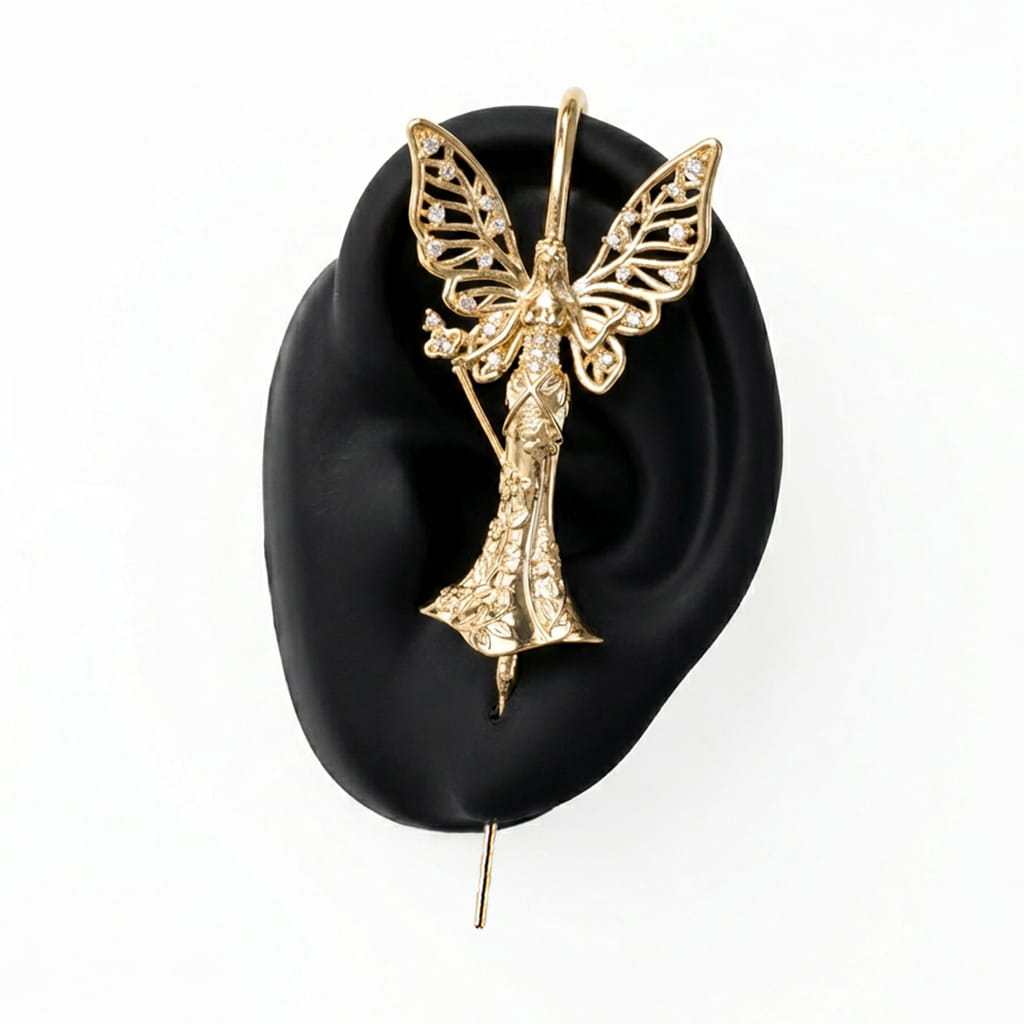 Forrest Fairy ear cuff in gold on a black ear form