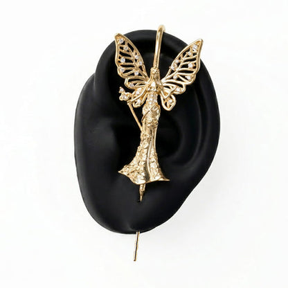 Forrest Fairy ear cuff in gold on a black ear form