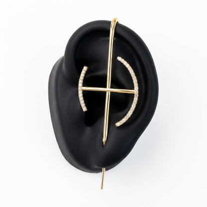 Elevate ear cuff in gold on a black ear form