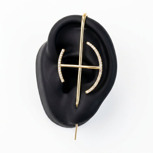 Elevate ear cuff in gold on a black ear form