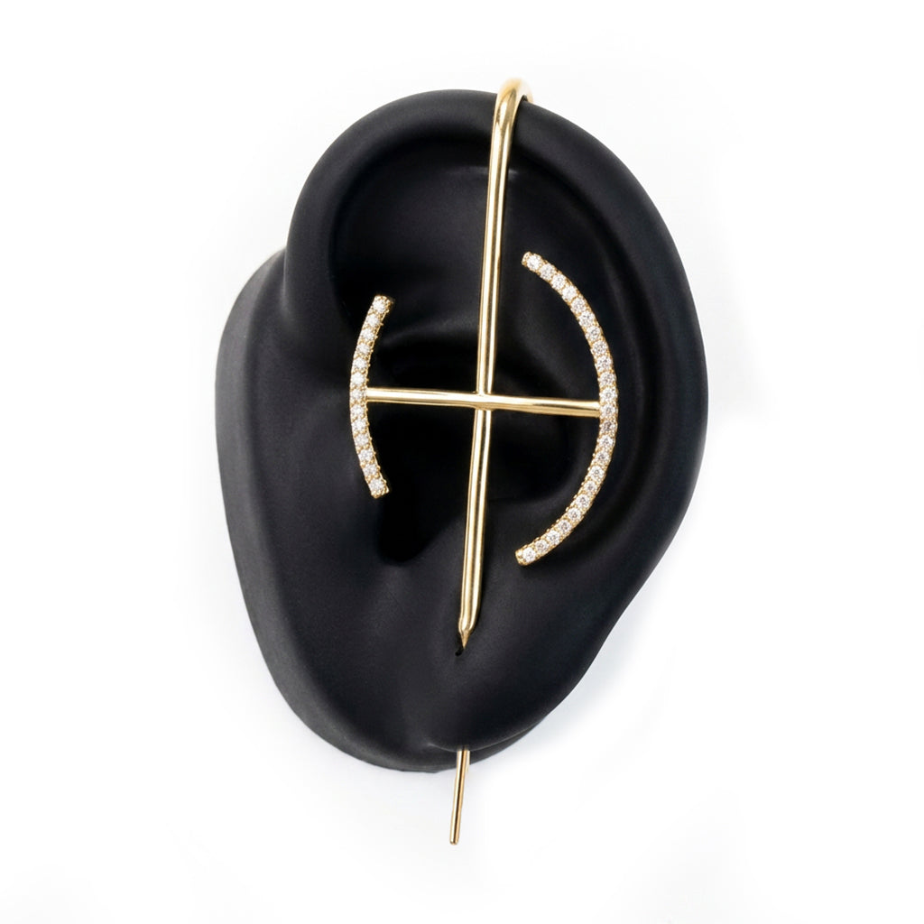 Elevate ear cuff in gold on a black ear form