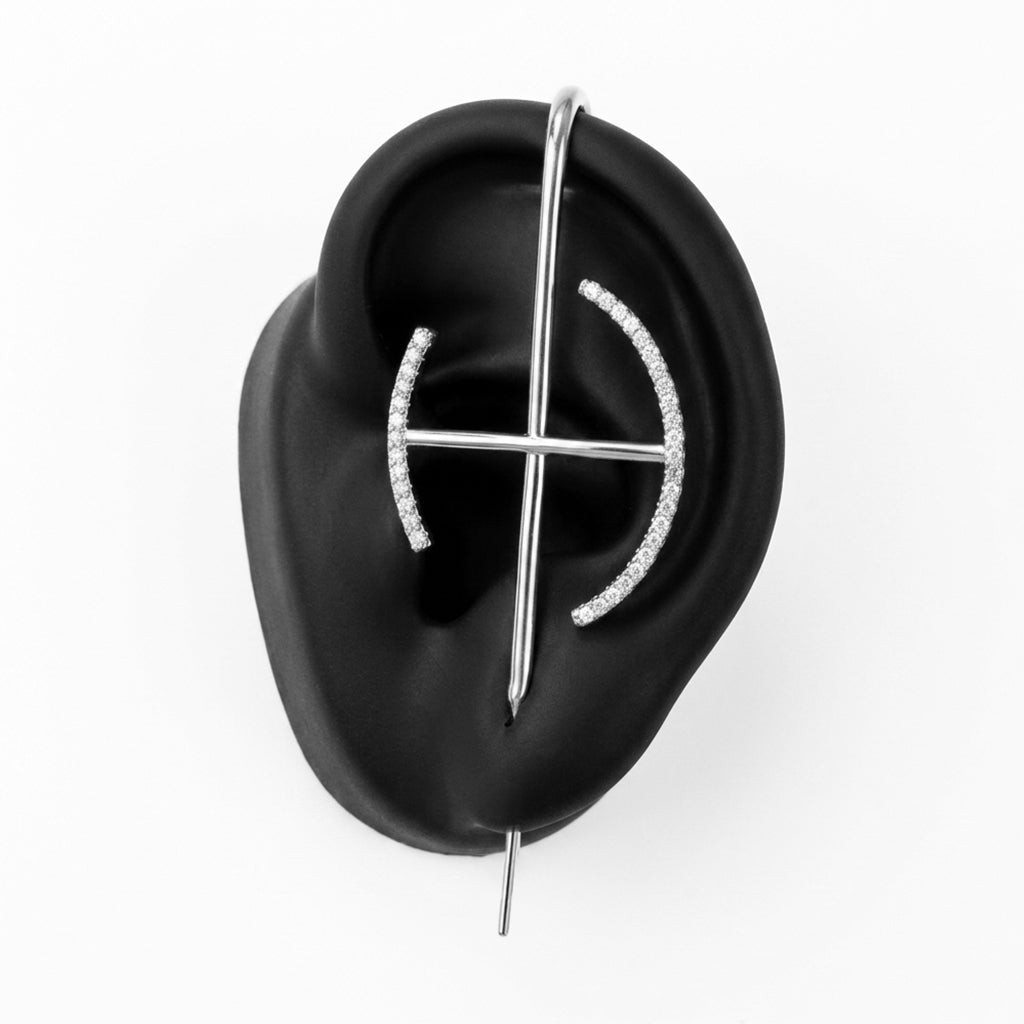 Elevate ear cuff in silver on a black ear form