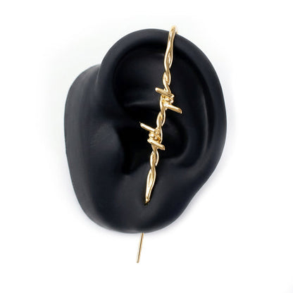 [Caution] ear cuff in gold on a black ear form