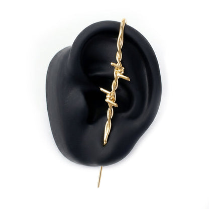 [Caution] ear cuff in gold on a black ear form