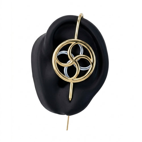 Kinetic Loop ear cuff in gold on a black ear form