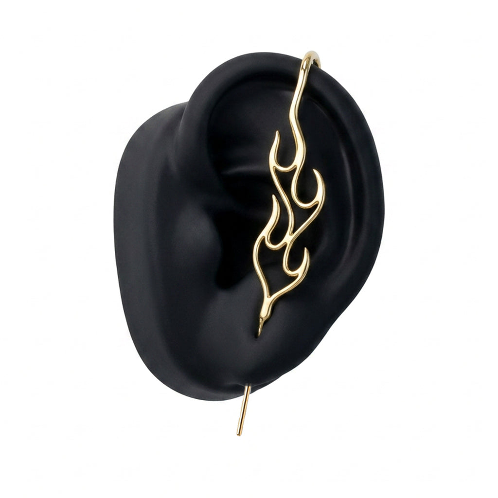Inner Fire ear cuff in gold on a black ear form