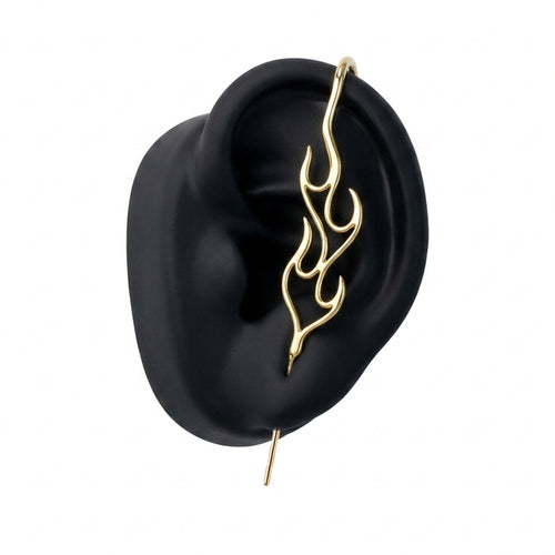 Inner Fire ear cuff in gold on a black ear form