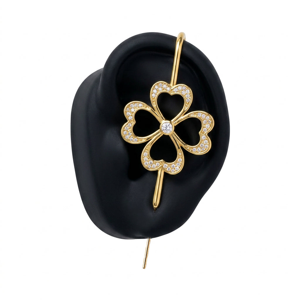 Lucky Clover ear cuff in gold on a black ear form