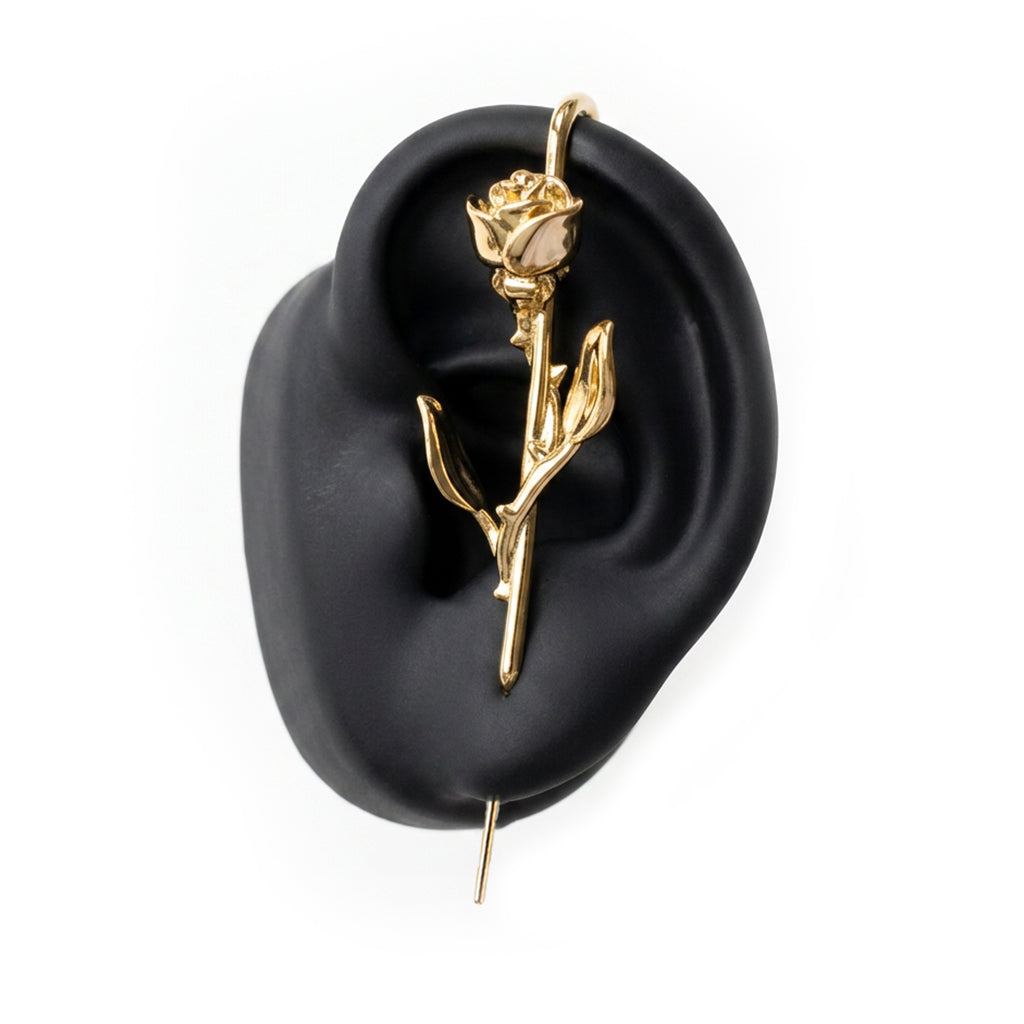 Radiant Rose ear cuff in gold on a black ear form