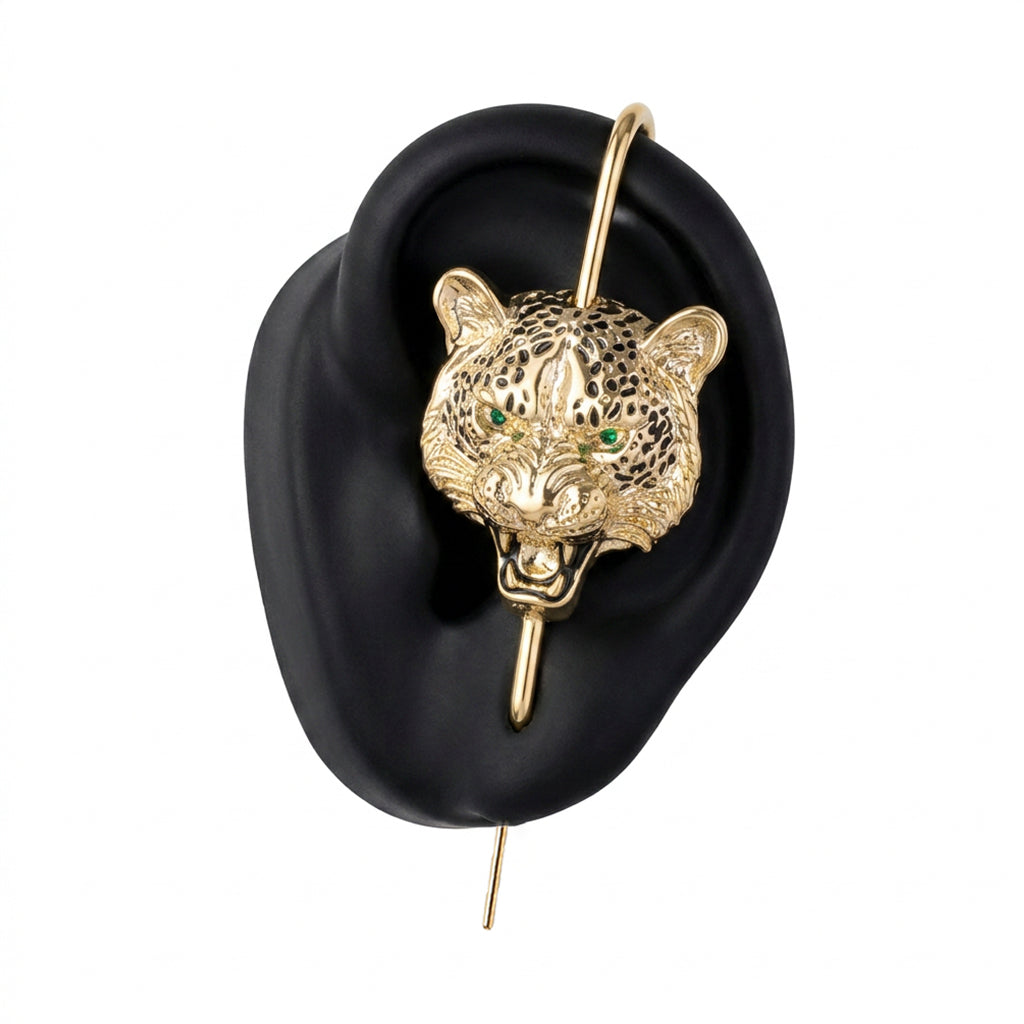 Savage Leopard ear cuff in gold on a black ear form
