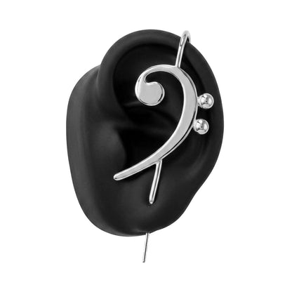 Bass Clef ear cuff in silver on a black ear form