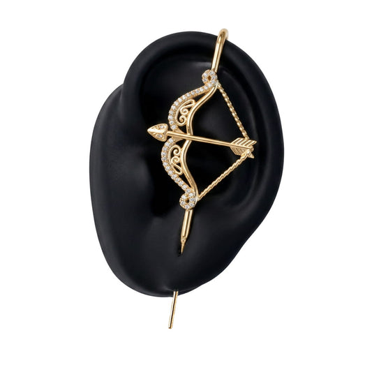 Divine Strike ear cuff in gold on a black ear form