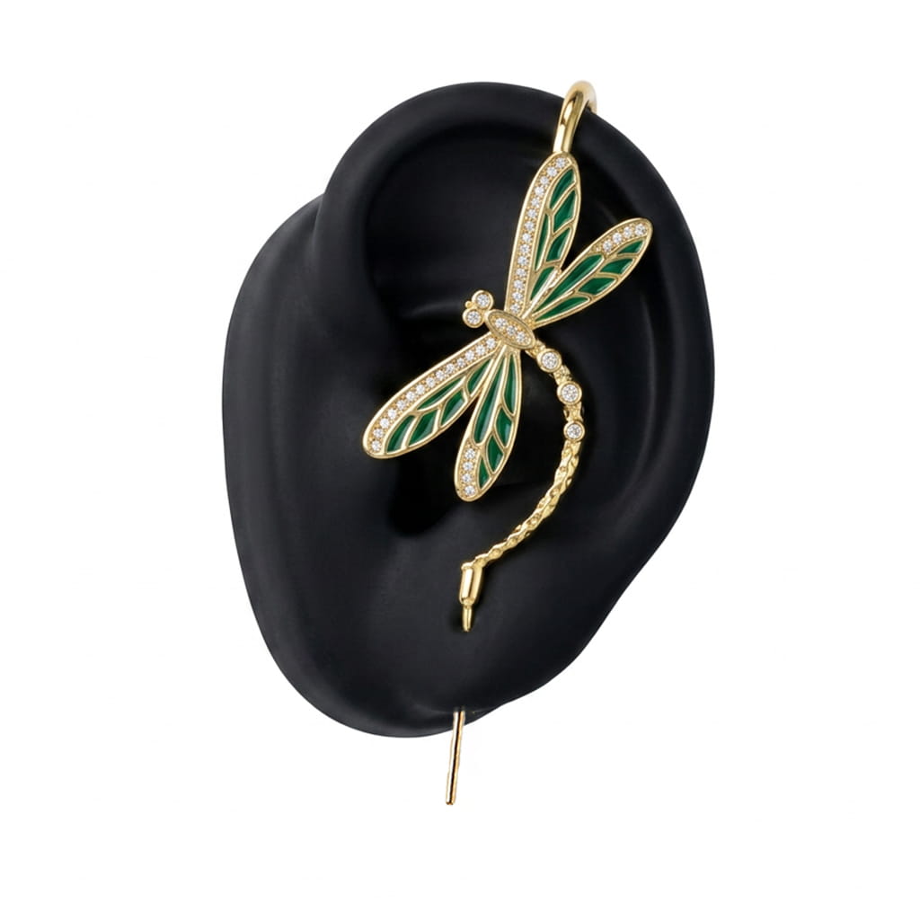 Dragonfly ear cuff in gold on a black ear form