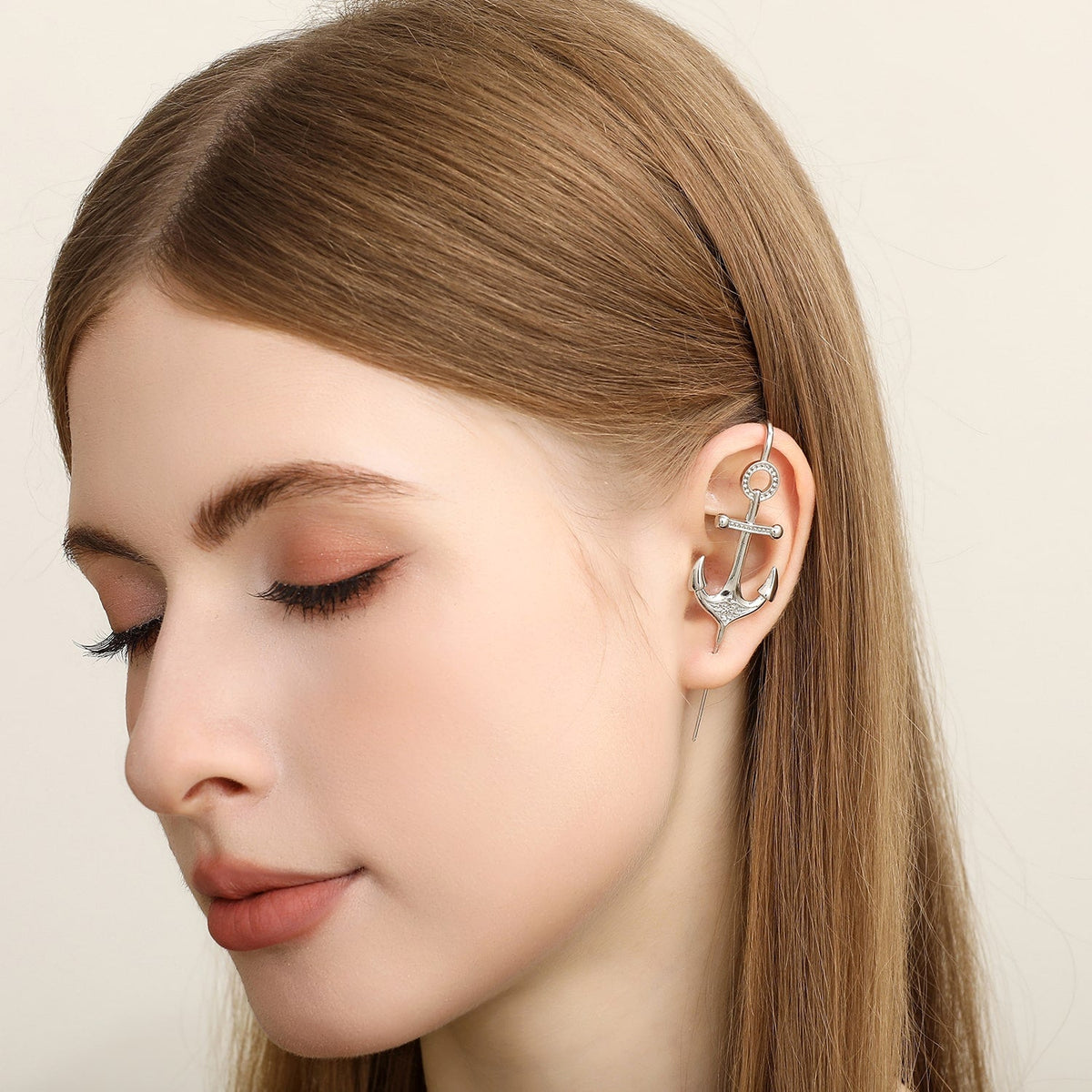 Safe Haven ear cuff worn on the ear, profile view