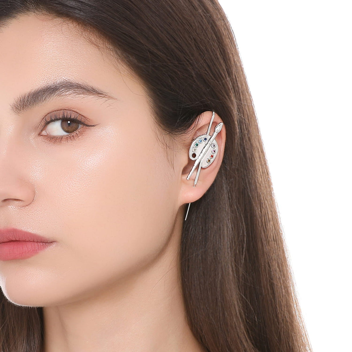 Artist ear cuff worn on the ear, profile view