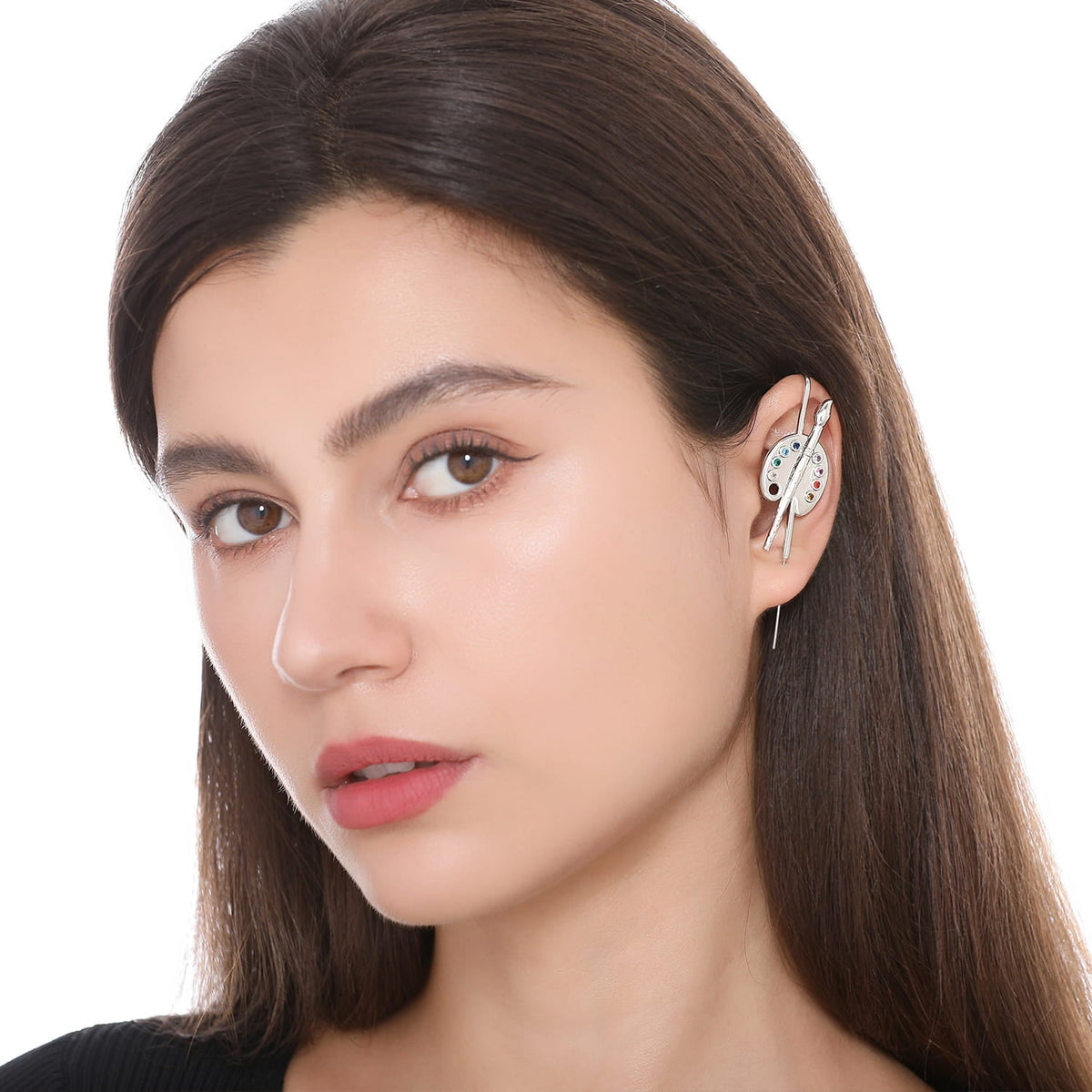 Artist ear cuff worn on the ear, profile view