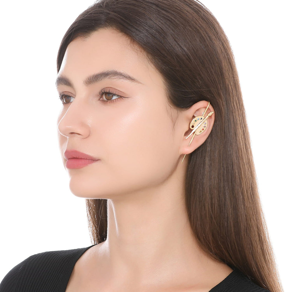 Artist ear cuff worn on the ear, profile view