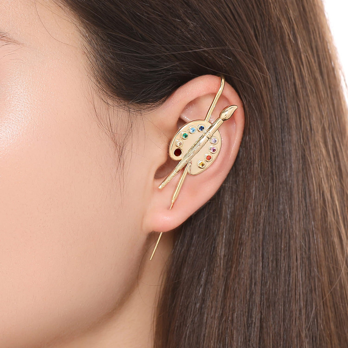 Artist ear cuff worn on the ear, profile view