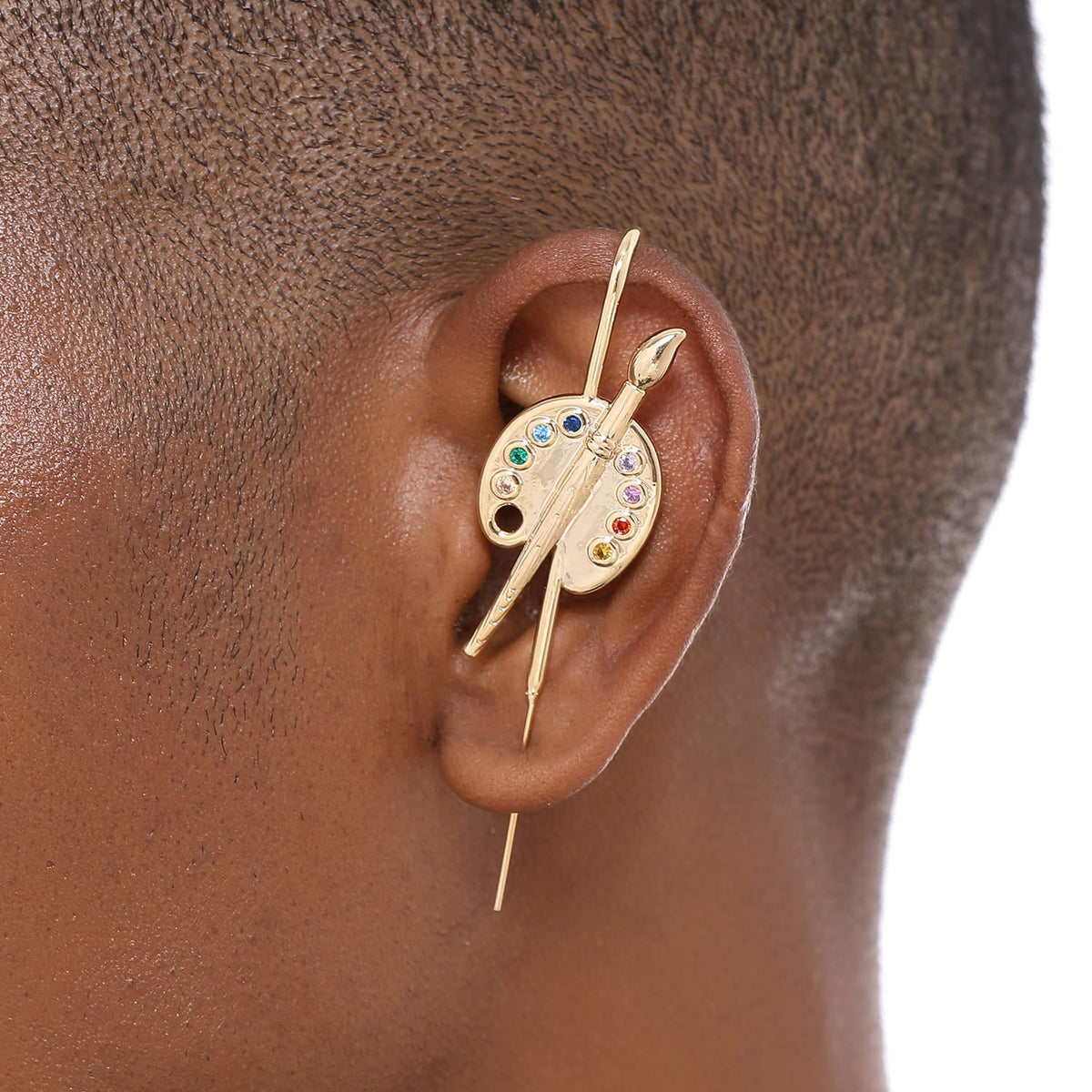 Artist ear cuff worn on the ear, profile view