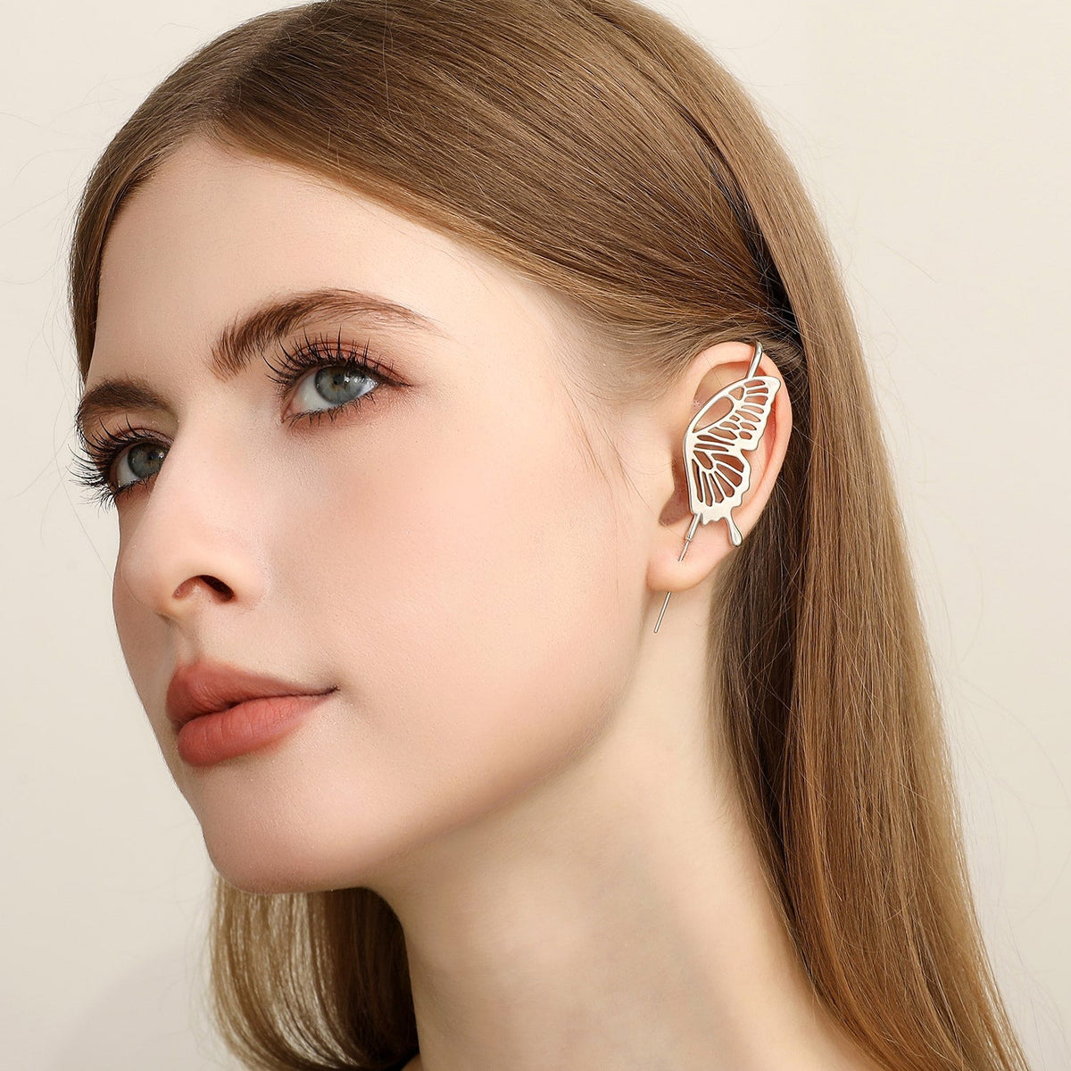 Gentle Butterfly ear cuff worn on the ear, profile view