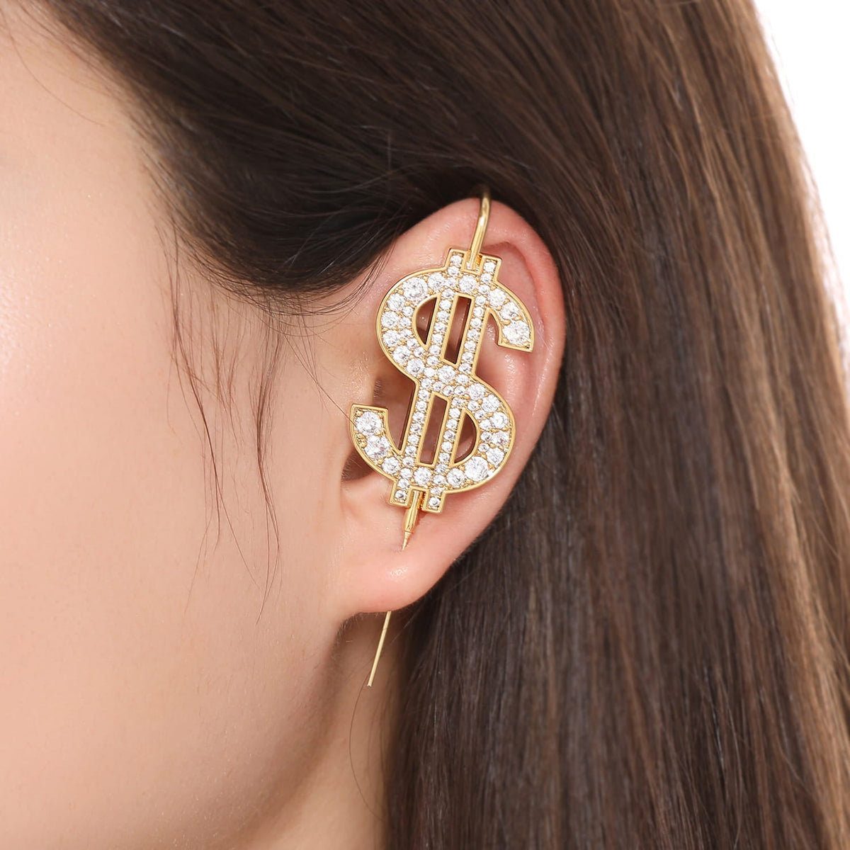 CA$H ear cuff worn on the ear, profile view