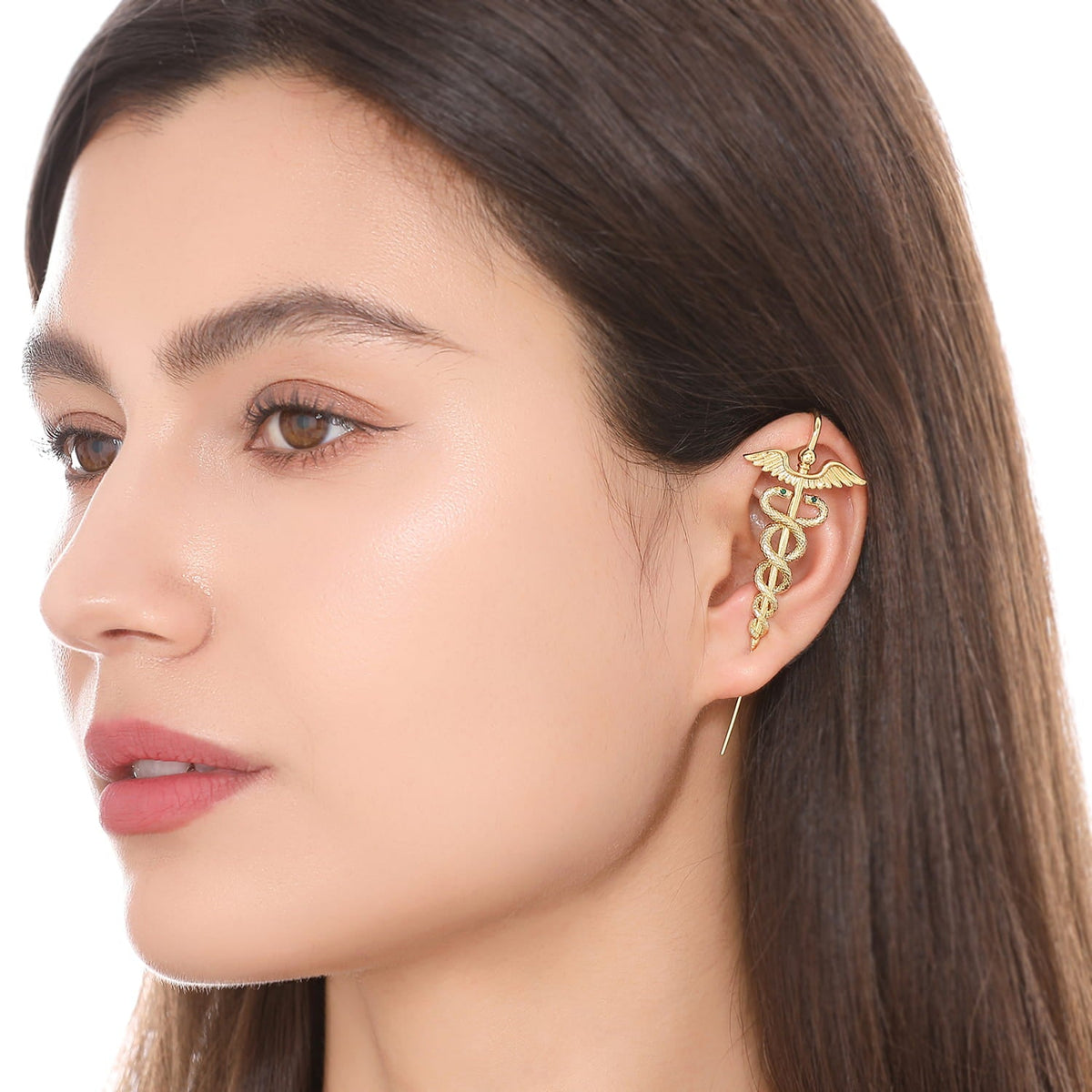 Caduceus ear cuff worn on the ear, profile view