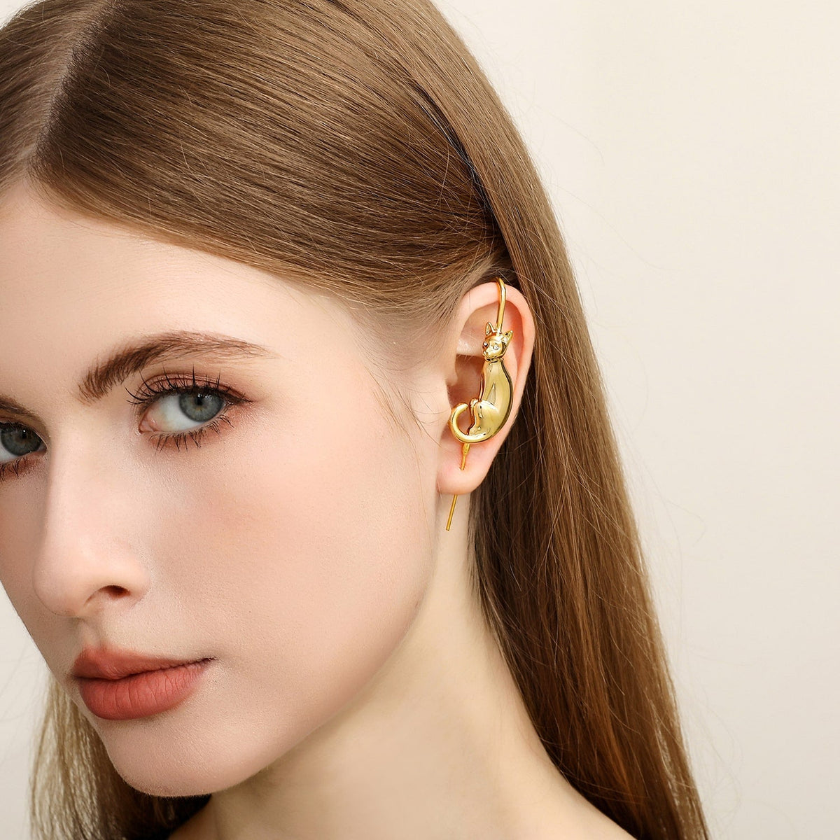 Mystic Cat ear cuff worn on the ear, profile view