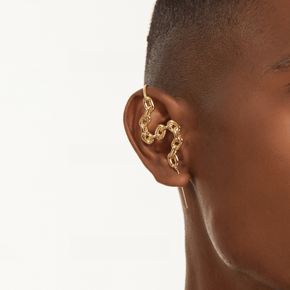 Chain-Link ear cuff in gold worn on the ear, profile view
