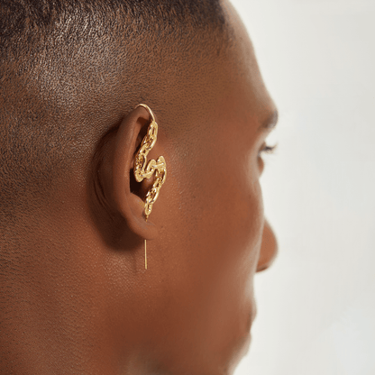 Chain-Link ear cuff in gold worn on the ear, profile view