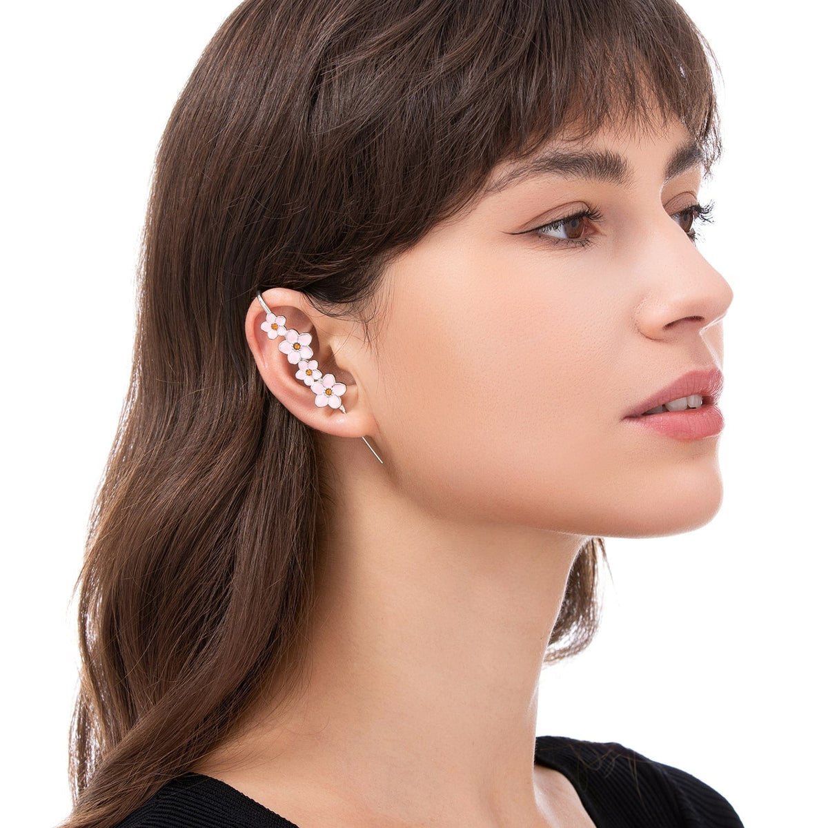 Cherry Blossom ear cuff worn on the ear, profile view