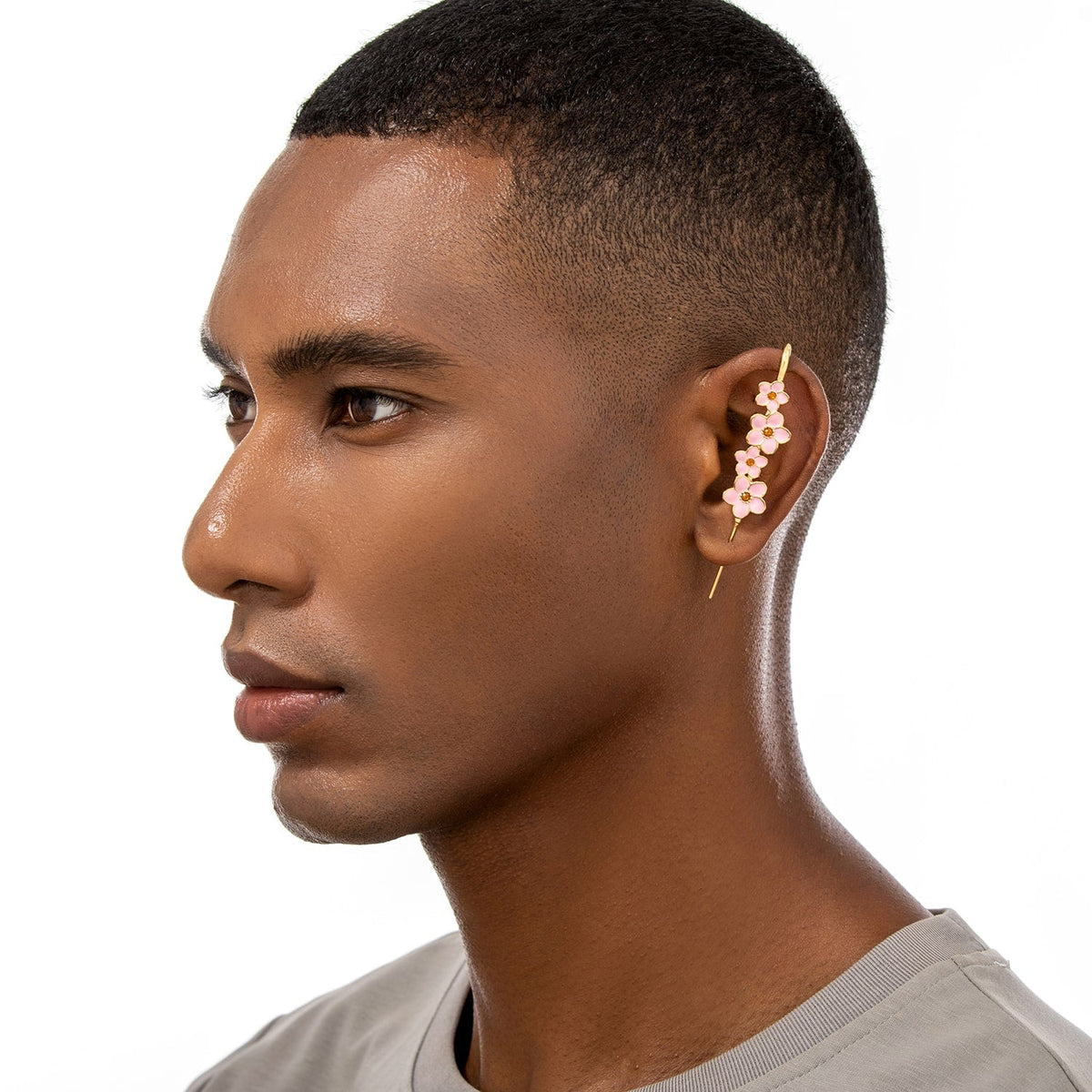 Cherry Blossom ear cuff worn on the ear, profile view
