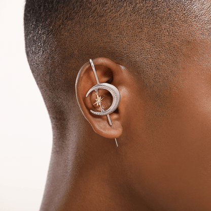Cosmic Connection ear cuff in silver worn on the ear, profile view