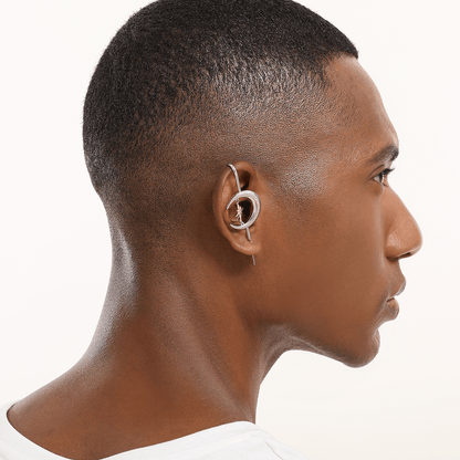 Cosmic Connection ear cuff in silver worn on the ear, profile view