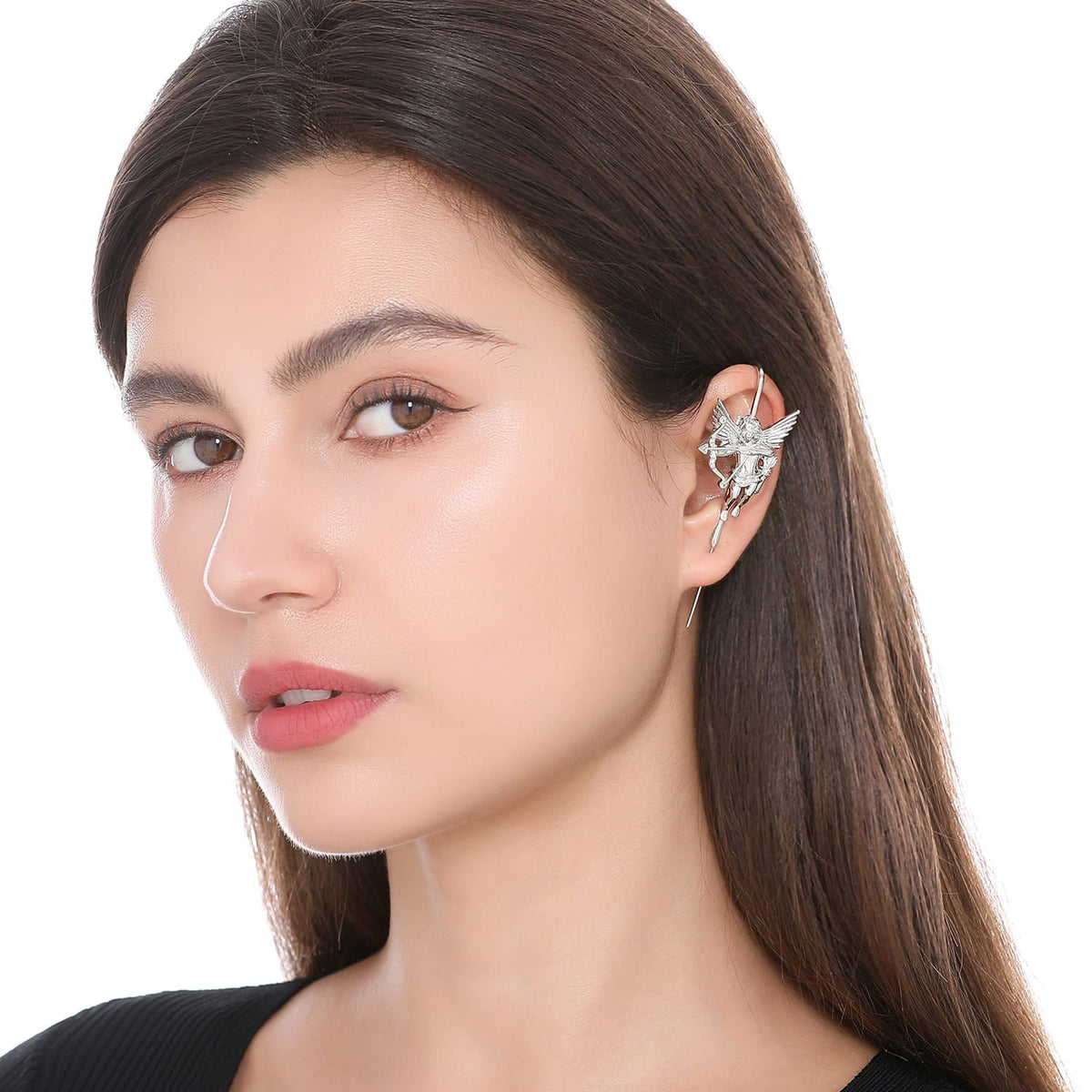 Cupid ear cuff worn on the ear, profile view