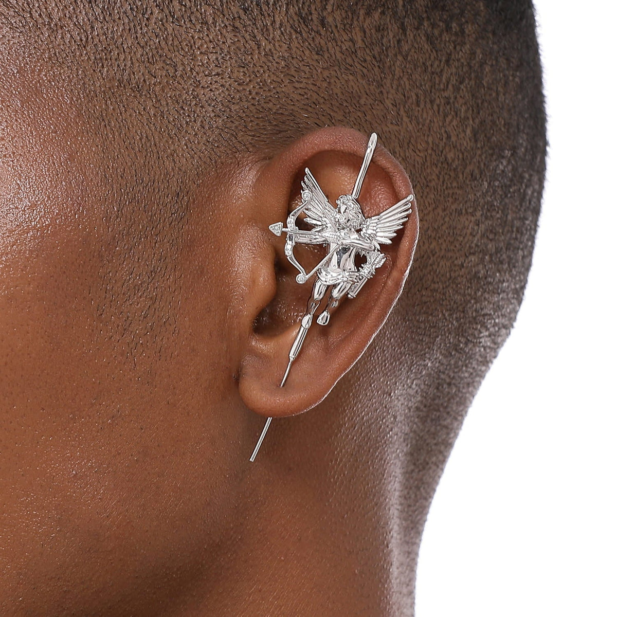 Cupid ear cuff worn on the ear, profile view