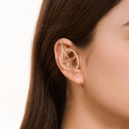 Elevate ear cuff in gold worn on the ear, profile view