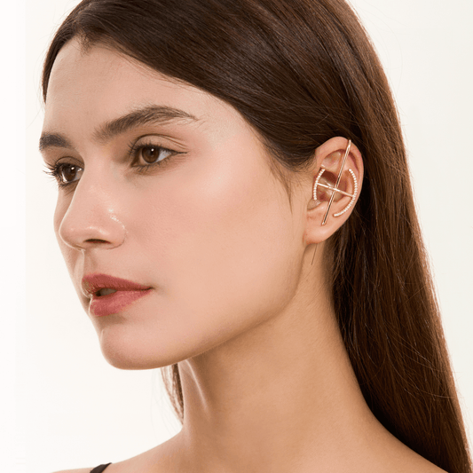 Elevate ear cuff in gold worn on the ear, profile view