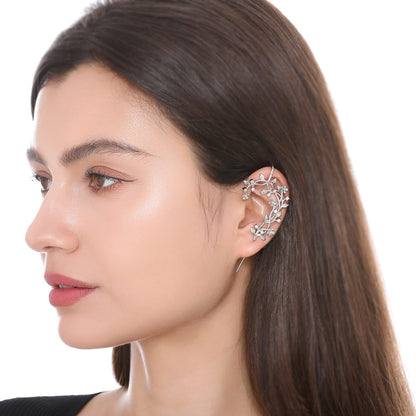 Flourishing ear cuff worn on the ear, profile view