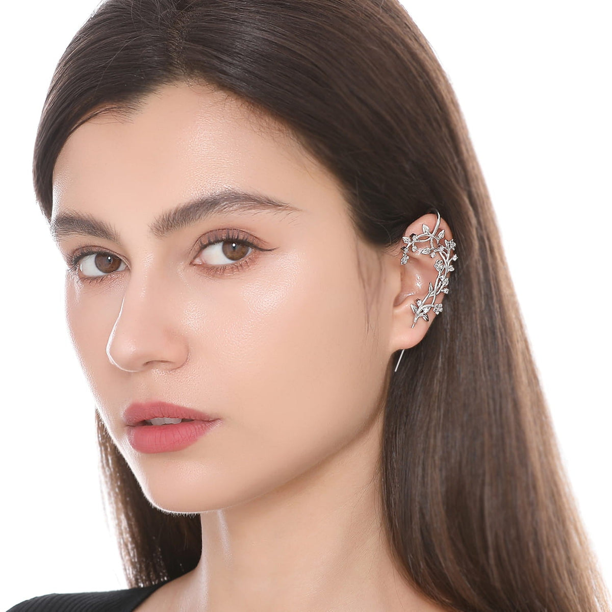 Flourishing ear cuff worn on the ear, profile view