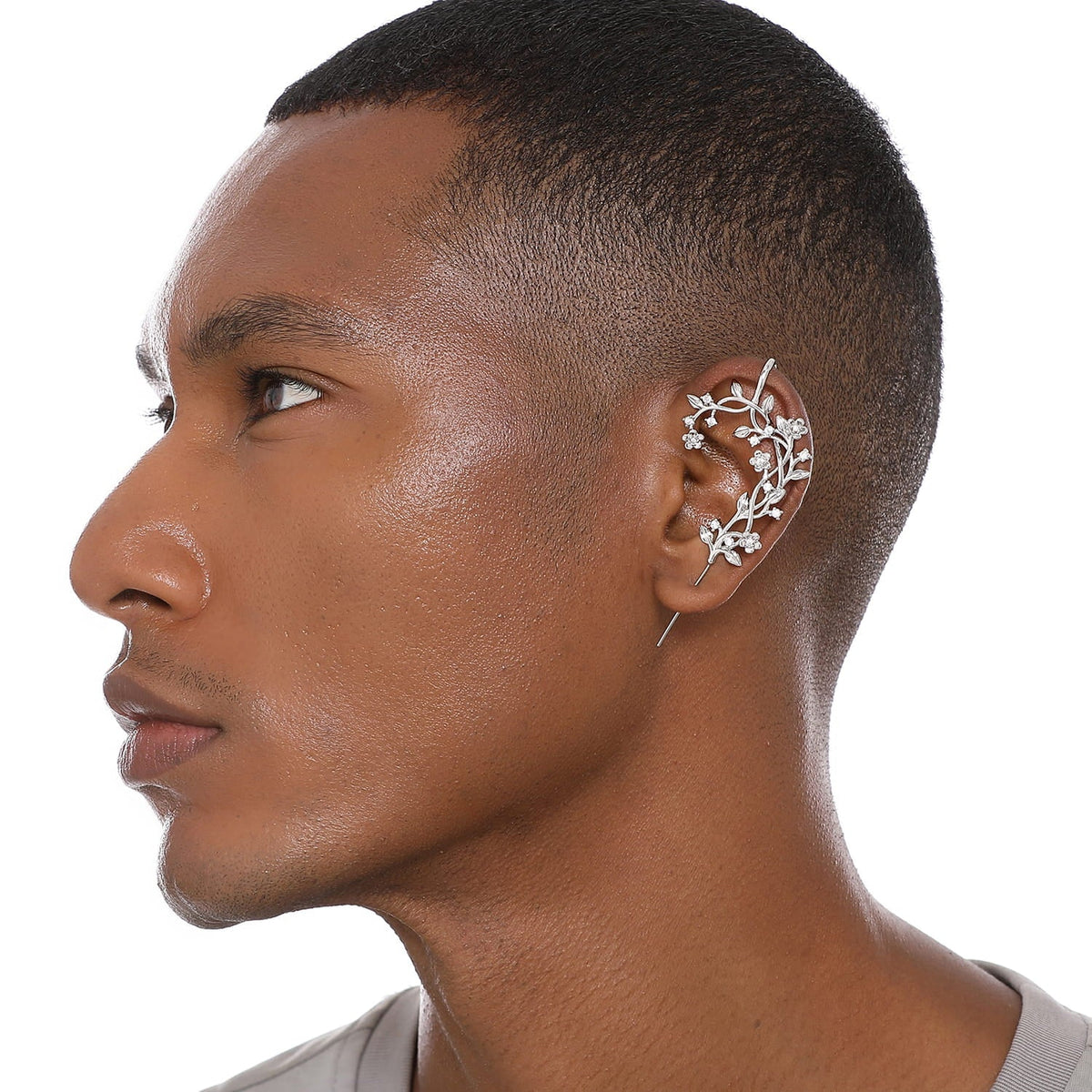 Flourishing ear cuff worn on the ear, profile view