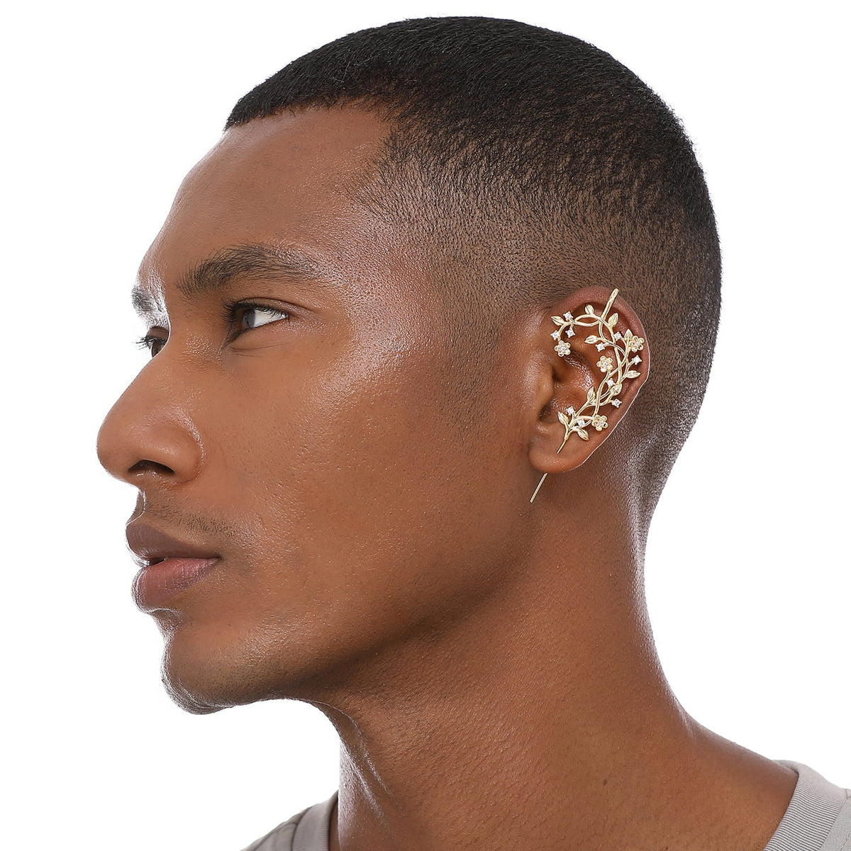 Flourishing ear cuff worn on the ear, profile view