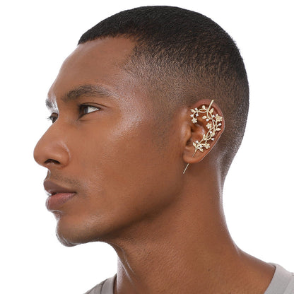 Flourishing ear cuff worn on the ear, profile view