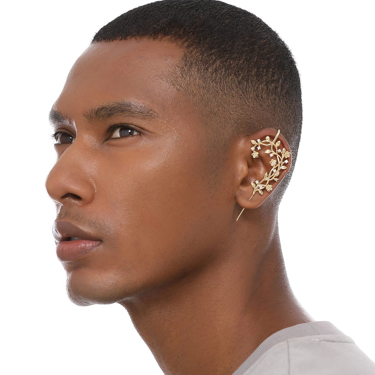 Flourishing ear cuff worn on the ear, profile view